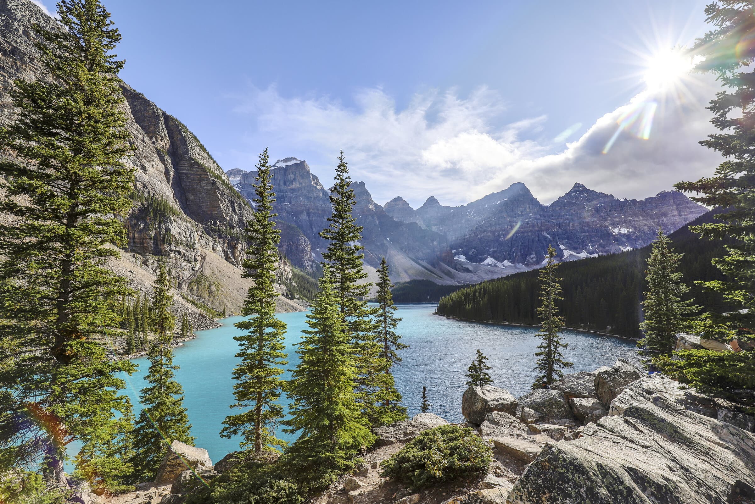 Moraine Lake with towering pines and peaks